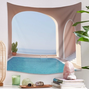 Detailed view of bohemian wall tapestry with surreal pool design in a cozy room setting