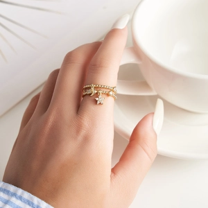 Double-layered gold adjustable ring featuring sparkling moon and star zircon pendants
