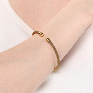 Detail of 4mm 18K gold plated mesh cable stainless steel open cuff bracelet with sphere tips