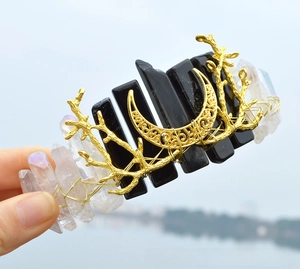 Detailed handmade crystal crown with natural amethyst, golden moon and branch accents
