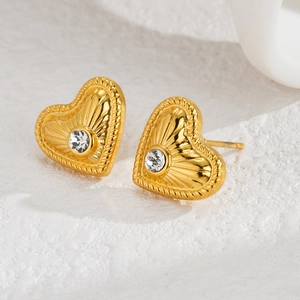Golden heart-shaped stainless steel stud earrings featuring a sparkling zircon center