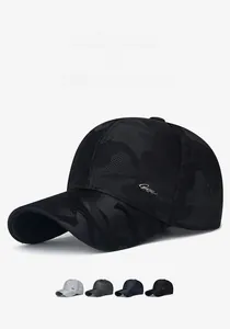 Detail of camouflage baseball cap with metal logo and four available color options