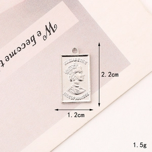 Detailed view of silver Elizabeth II rectangular coin pendant for DIY jewelry making
