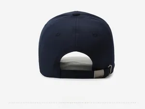 Rear view of navy cotton baseball cap featuring adjustable metal buckle and strap