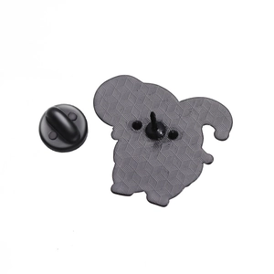 Creative green frog cartoon enamel pin back view with textured black metal base and clutch
