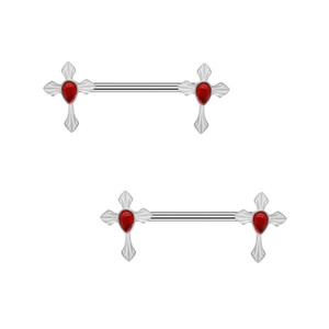 Detailed view of silver nipple rings with cross ends and inlaid red gemstones