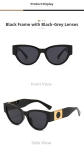 Detail of oval cat-eye sunglasses with wide temples and circular metallic hinge accents