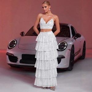 Detail of white sequin crop top and layered tiered maxi skirt set for women