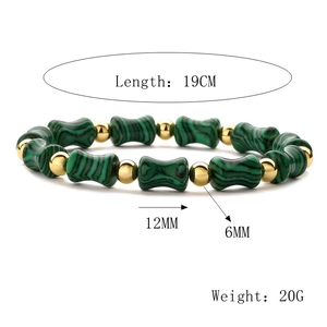 Detail of green malachite style bamboo joint bracelet with gold beads 19cm length