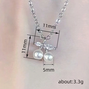 Elegant cherry pendant necklace with white pearls and cubic zirconia on 11mm silver scale