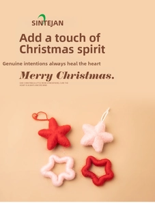 Set of four handmade wool felt star ornaments in red and pink for Christmas decor