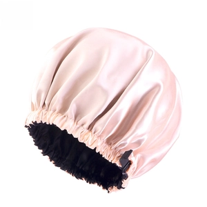 Detail of double-layer satin sleep cap with adjustable buckle and smooth silk texture