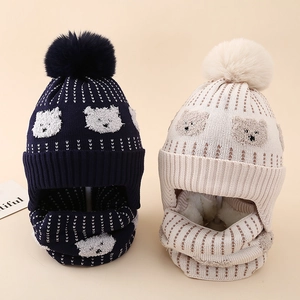 Detail view of boys fleece-lined knitted hat and scarf sets with cute bear patches