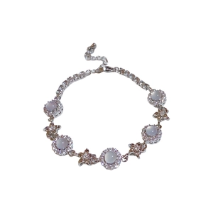 Elegant flower bracelet featuring round chalcedony and pave zircon stones in silver finish