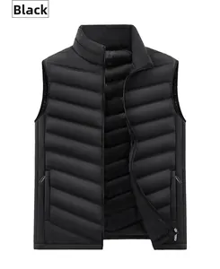 Detail view of black quilted puffer vest with stand collar and side zipper pockets