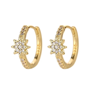 Close-up of golden S925 sterling silver star hoop earrings with clear zircon stones