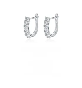 Close-up of S925 sterling silver earrings with five brilliant round cut moissanite stones