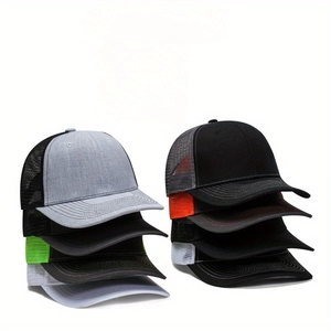 Close-up of colorful trucker hats with breathable mesh back and curved brim in stacks