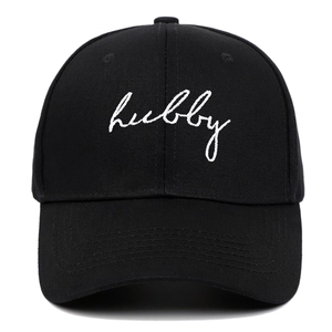 Classic black cotton baseball cap featuring white Hubby embroidery and a curved brim