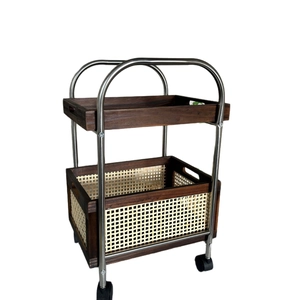 Modern two-tier stainless steel trolley with solid wood tray and rattan storage basket
