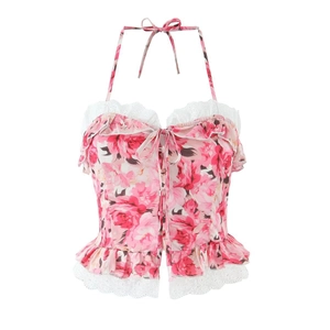 Pink floral halter top with white lace trim and corset-style ribbon bow design
