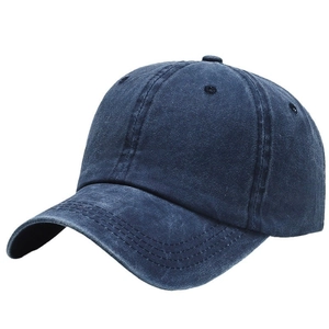 Navy washed cotton baseball cap featuring vintage distressed texture and curved brim