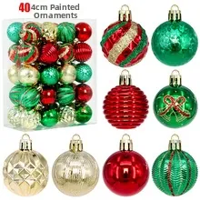 Detail of 4cm painted Christmas balls with spiral and grid patterns in red and gold
