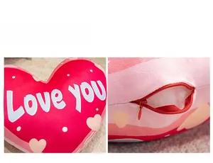 Detail showing the invisible zipper and soft plush filling of the heart-shaped pillow