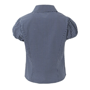 Detailed back view of a navy blue polka dot short sleeve blouse with feminine puff sleeves