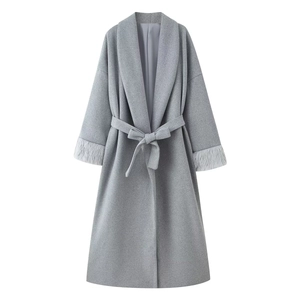 Elegant grey long wool coat with belted waist and stylish faux fur cuffs for women
