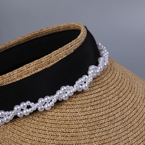 Elegant wide-brim UV protection straw sun hat featuring double-row imitation pearl headband