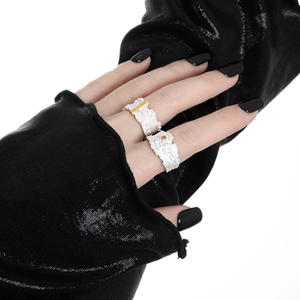S925 silver irregular texture rings set with gold accents worn on model's hand