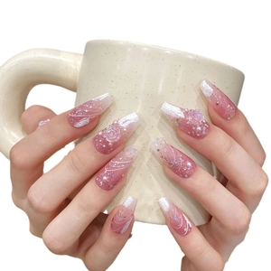 Faux ongles longs coffin dégradé rose avec fleurs 3D, perles et paillettes brillantes