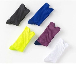Close-up of five colorful cushioned crew socks with ribbed texture and arch support