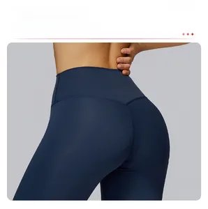 Close-up of high-waisted navy yoga shorts with V-shaped stitching for a lifting effect