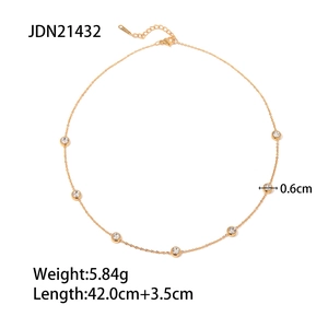 Polished gold-plated stainless steel necklace with seven bezel-set round cubic zirconia