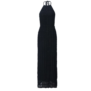 Detail of black halter neck dress featuring horizontal pleated fabric and lace-up ties