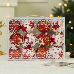 Macro shot of 12 red and white glitter Christmas ornaments in a portable gift box