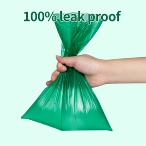 Close-up demonstrating the 100% leak-proof feature of the green biodegradable poop bag