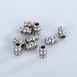 Close-up of corrugated stainless steel silver spacer beads for DIY jewelry making