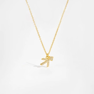 Macro detail of S925 silver Sagittarius constellation pendant with white zircon stones