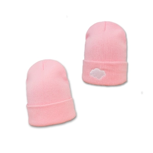 Trendy pink knitted cloud beanies for women in a warm, minimalist Japanese style