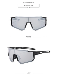 Close-up of rimless cycling sunglasses with black frame and silver mirrored lenses