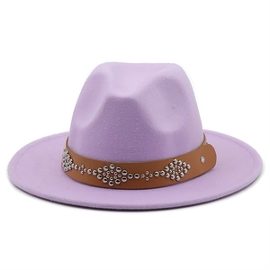 Detail of light purple fedora wool hat with brown leather band and silver studs