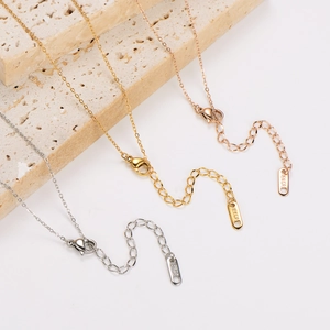 Double layered pearl heart pendant necklace in gold, rose gold and silver stainless steel
