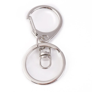 Close-up of a silver metal swivel lobster clasp with 360-degree rotation for DIY keychains