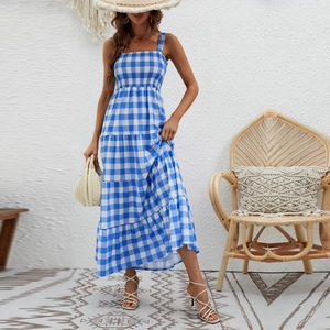 Detailed view of blue and white plaid bohemian maxi dress with tiered cake-style skirt