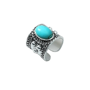 Vintage silver bohemian wide ring with oval turquoise stone and braided texture
