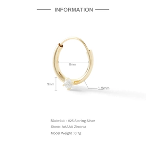 Detail of 925 sterling silver hoop earring with 8mm inner diameter and 3mm zircon stone