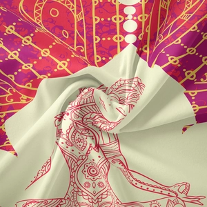 Macro detail of mandala tapestry showing soft polyester fabric texture and spiral folds